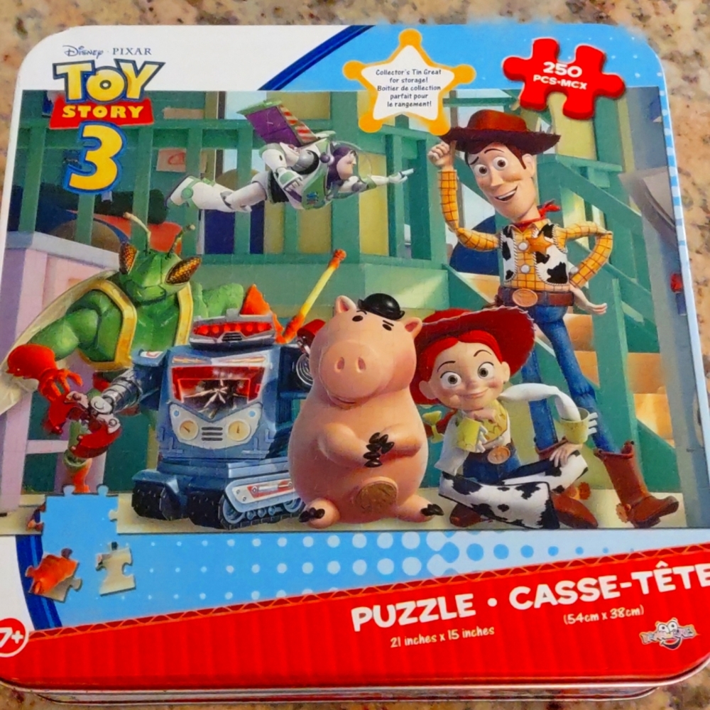 Brand new in a metal tin Disney TOY Story 3 Puzzle